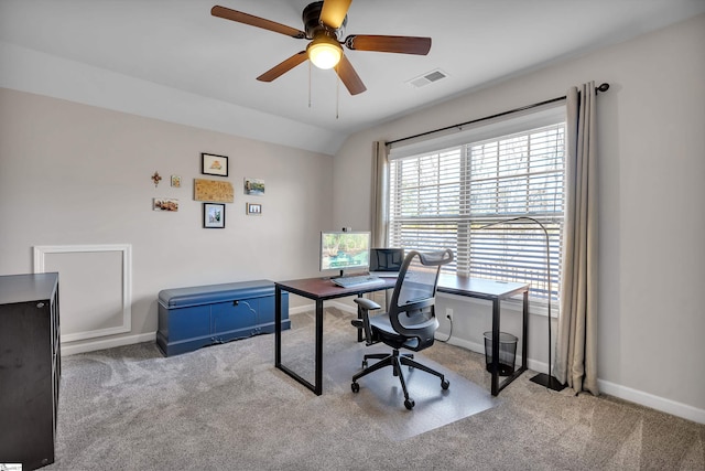 carpeted office featuring ceiling fan and vaulted ceiling