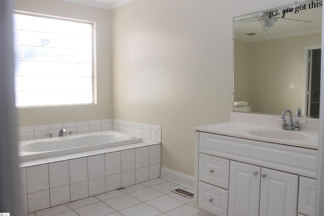 bathroom with tile patterned flooring, vanity, a relaxing tiled tub, and ornamental molding