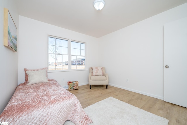 bedroom with light hardwood / wood-style flooring