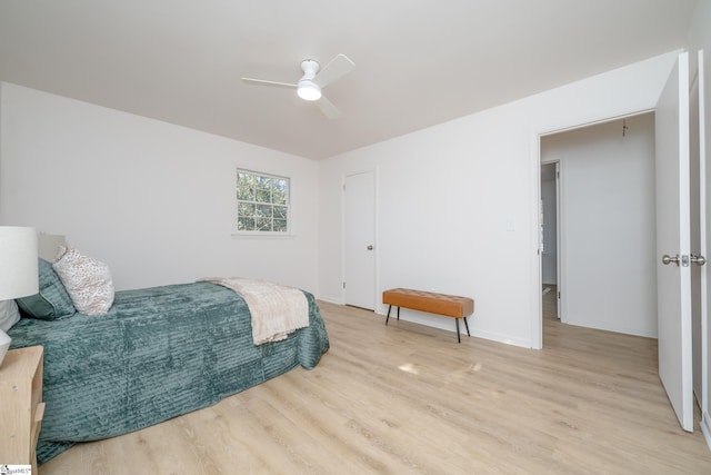 bedroom featuring ceiling fan and light hardwood / wood-style flooring