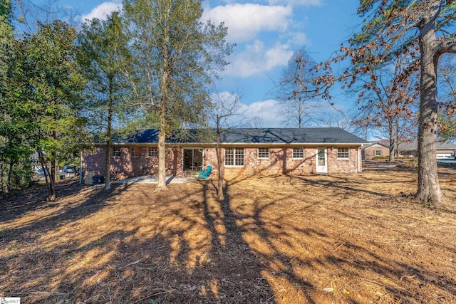 rear view of property with a patio area