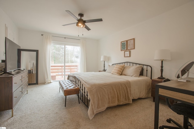 bedroom with ceiling fan, light colored carpet, and access to outside