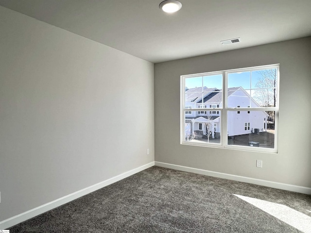 view of carpeted spare room