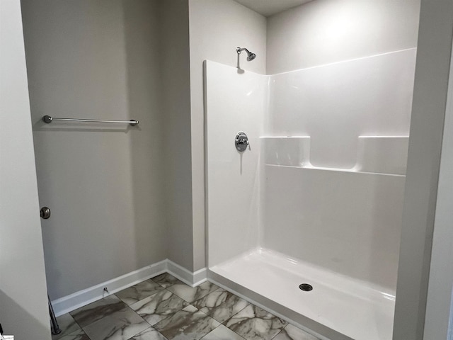 bathroom featuring walk in shower