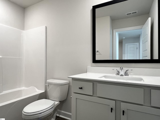 full bathroom featuring vanity, toilet, and  shower combination