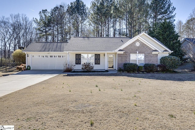 ranch-style house featuring a garage