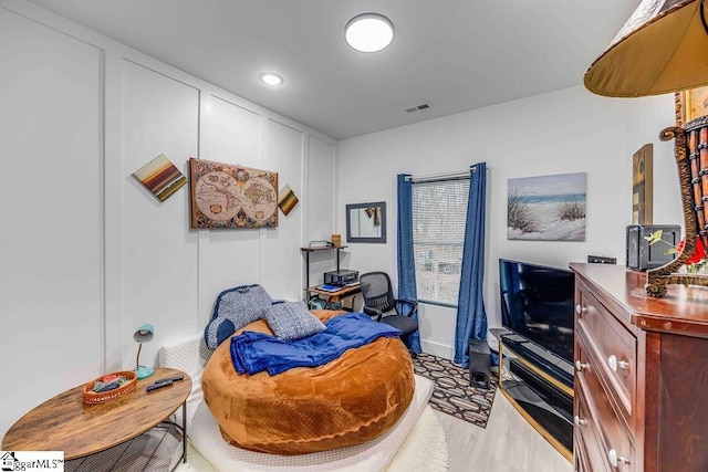 bedroom featuring light wood-type flooring