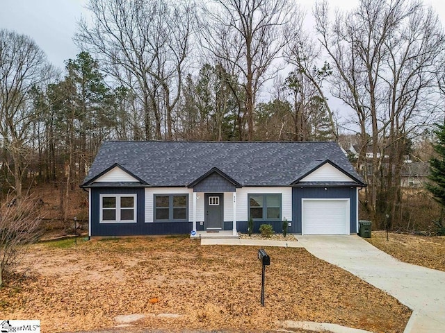 ranch-style home featuring a garage