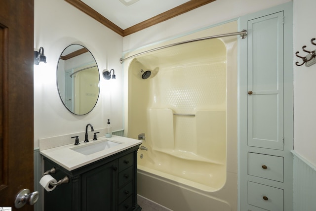 bathroom featuring ornamental molding, vanity, and shower / bathtub combination