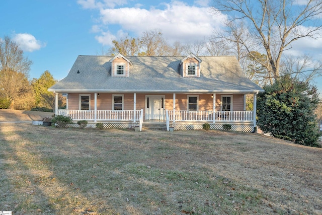 view of front of home featuring a porch and a front lawn