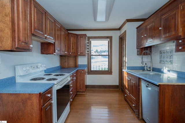 kitchen featuring sink, crown molding, dishwasher, electric range, and light wood-type flooring