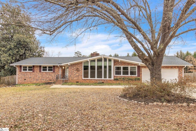 single story home featuring a garage