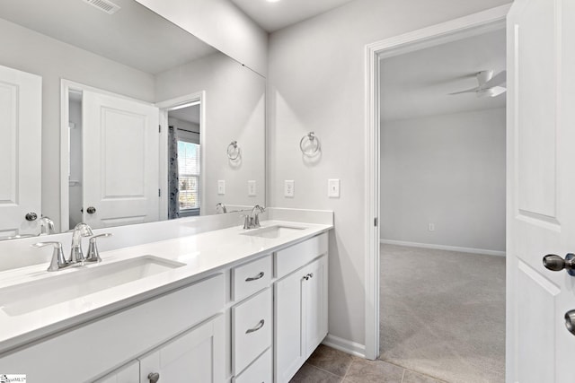 bathroom featuring vanity and ceiling fan