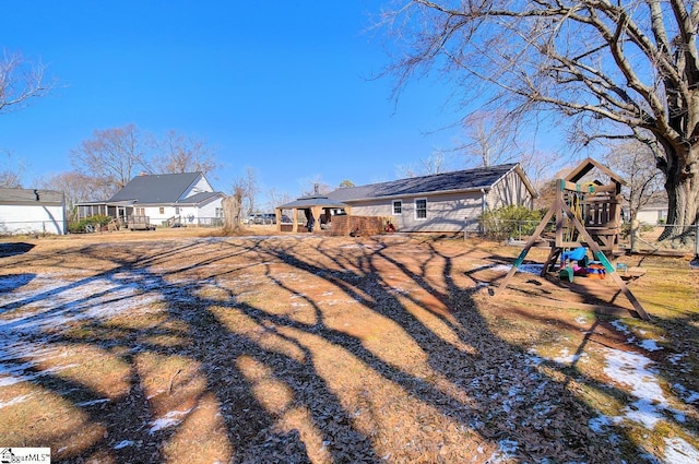 view of yard with a playground