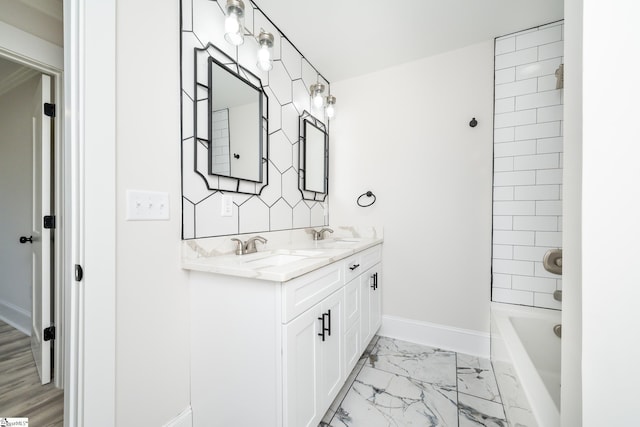 bathroom with vanity and bathing tub / shower combination