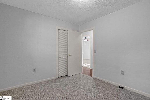 interior space with a textured ceiling