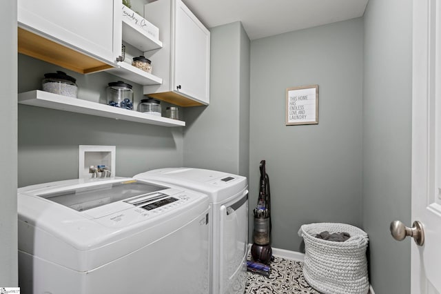 laundry area featuring cabinets and washer and dryer