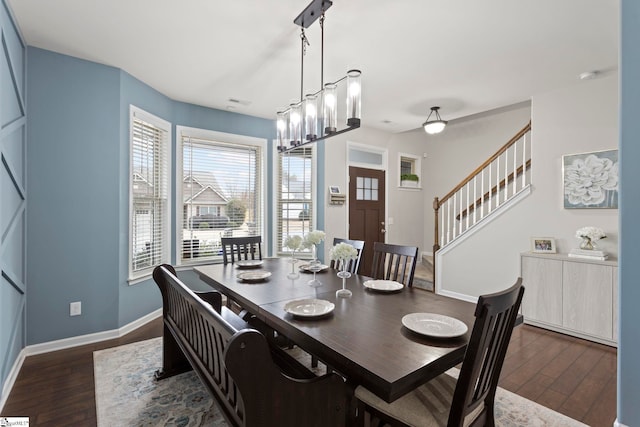 dining room featuring dark wood-type flooring