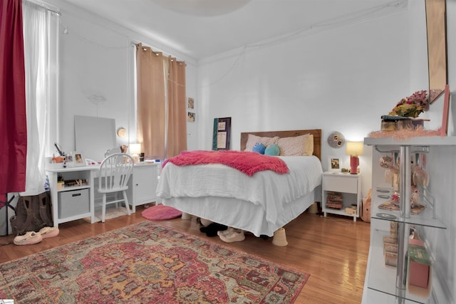 bedroom featuring hardwood / wood-style floors