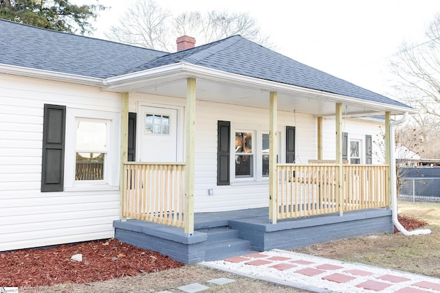 entrance to property with a porch