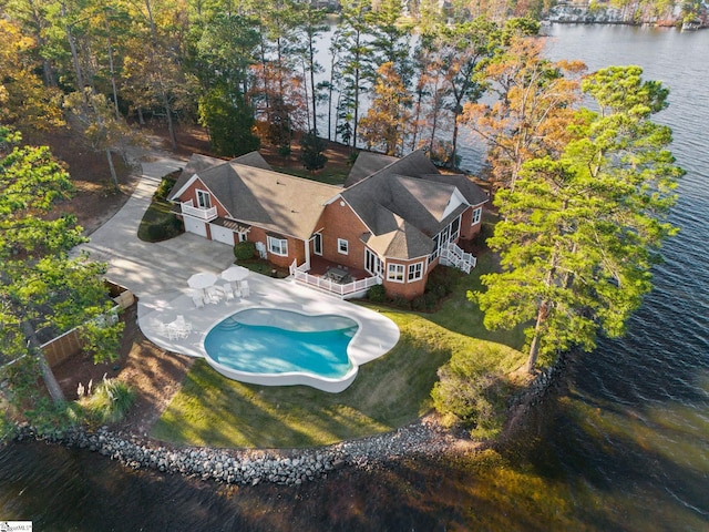 birds eye view of property featuring a water view