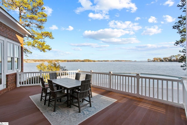 deck featuring a water view