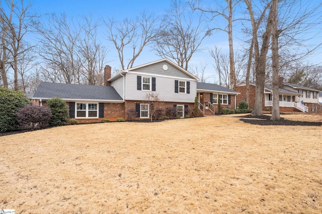 view of front of property with a porch and a front yard