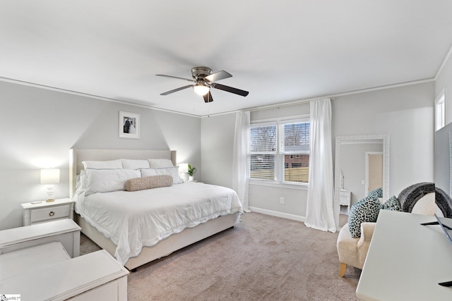 bedroom featuring ceiling fan, light colored carpet, crown molding, and multiple windows