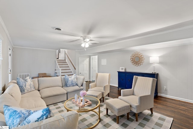 living room with ceiling fan, dark hardwood / wood-style flooring, and crown molding