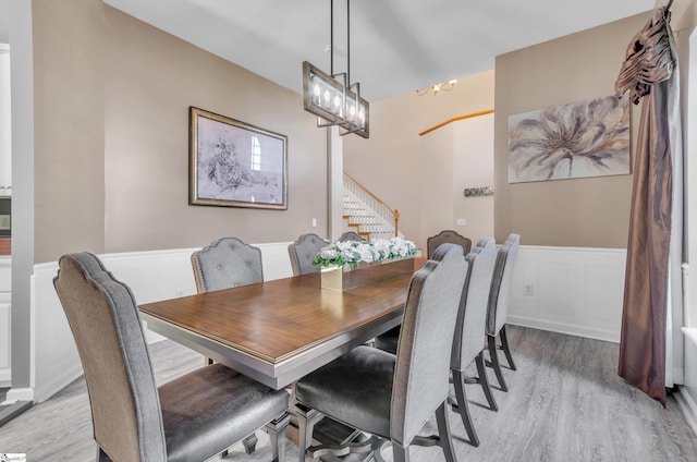 dining area featuring light wood-type flooring