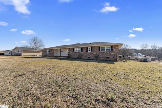 single story home with a front yard