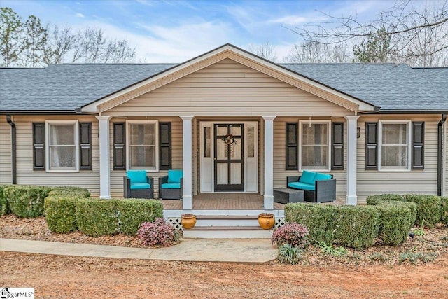 property entrance with a porch