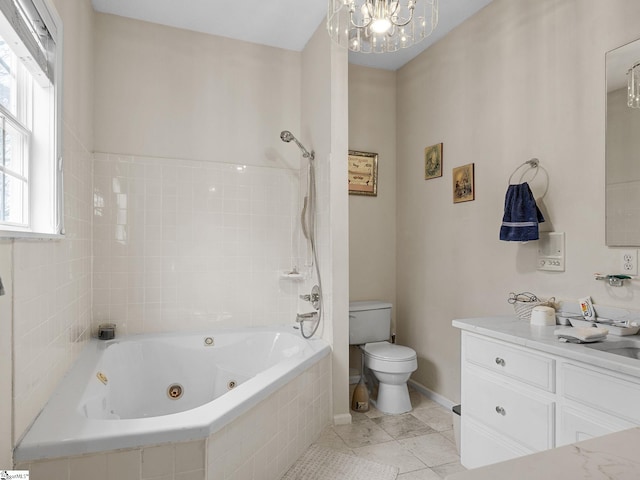 full bathroom with vanity, toilet, tile patterned floors, and tiled shower / bath