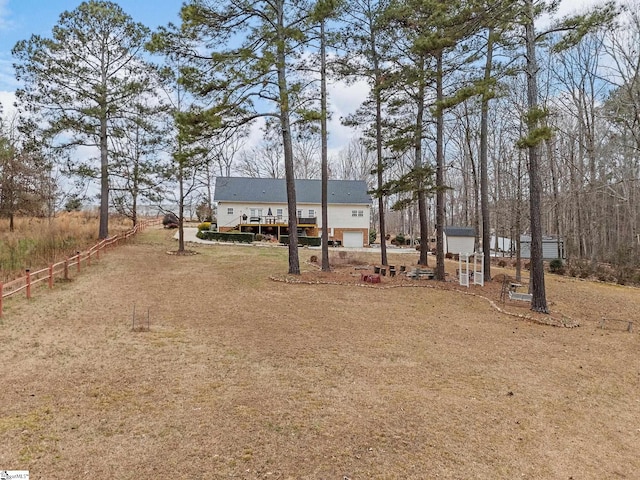 view of yard featuring a deck