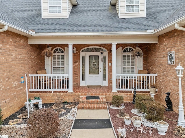 doorway to property with a porch