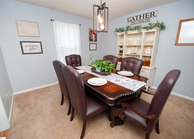 view of carpeted dining room