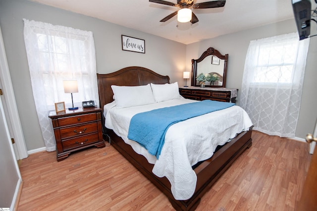 bedroom featuring light wood-type flooring and ceiling fan