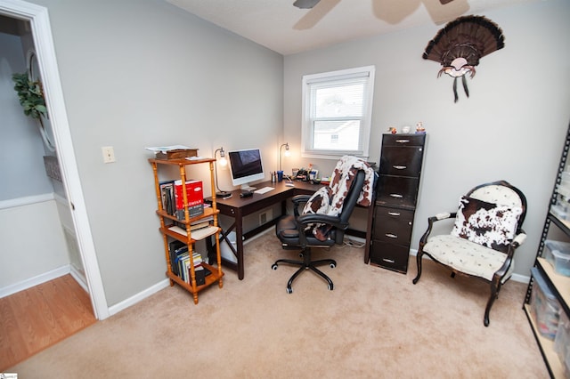 office with ceiling fan and light carpet