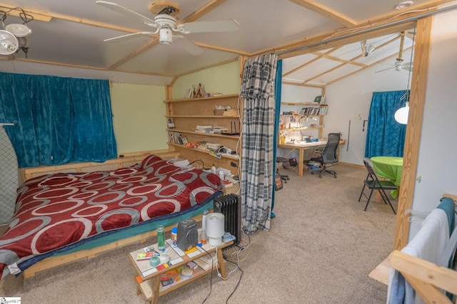 bedroom with ceiling fan, carpet flooring, and vaulted ceiling