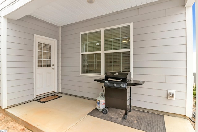 property entrance with a patio