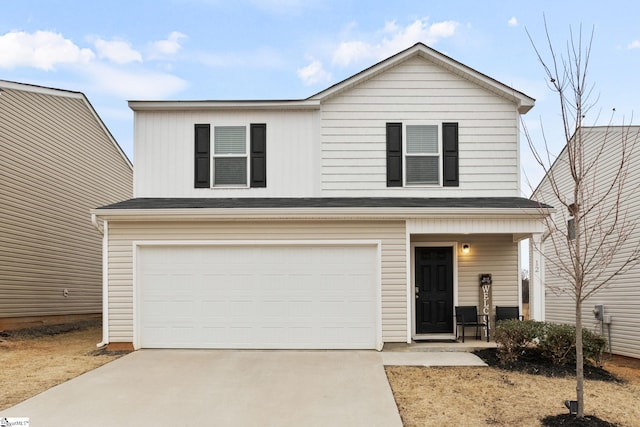 view of front of house with a garage and a porch