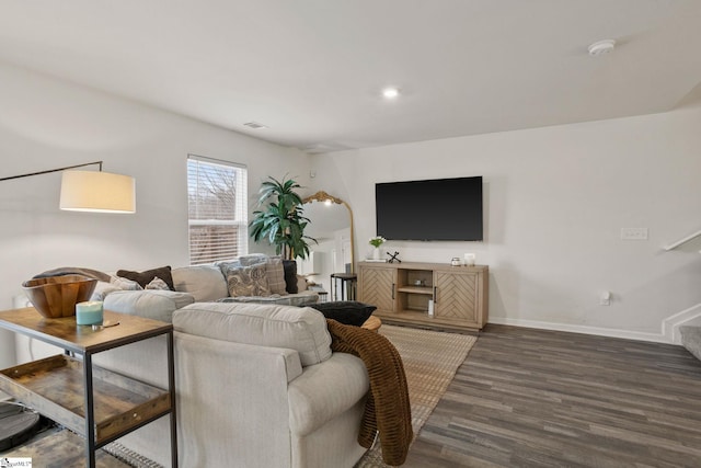 living room with dark hardwood / wood-style floors