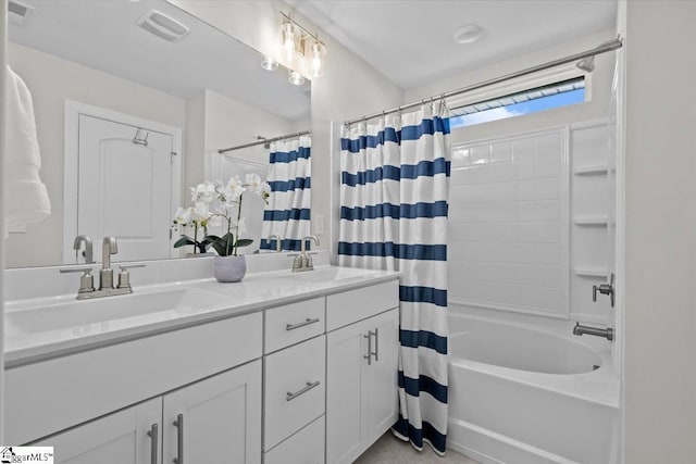 bathroom with vanity and shower / bathtub combination with curtain