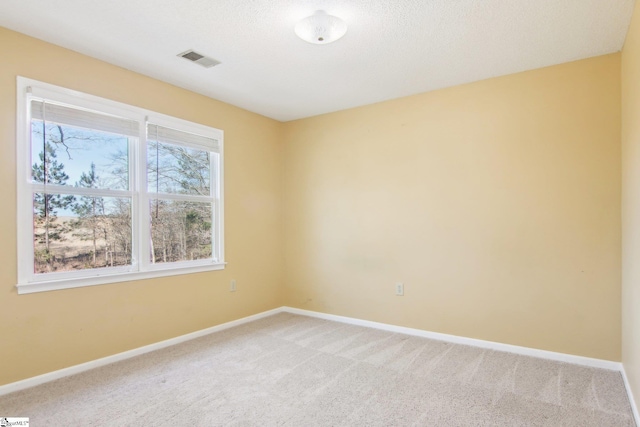 unfurnished room with carpet