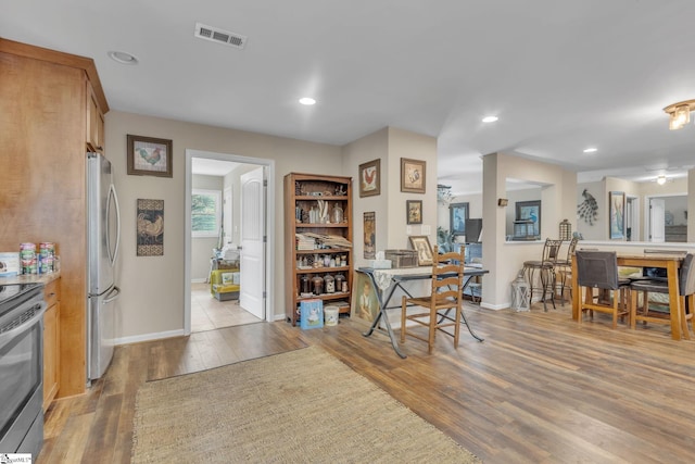 kitchen with stainless steel appliances and light wood-type flooring
