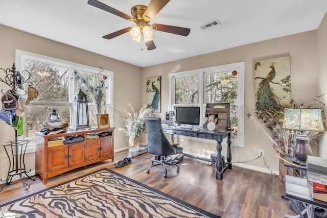 office space featuring hardwood / wood-style floors, a wealth of natural light, and ceiling fan