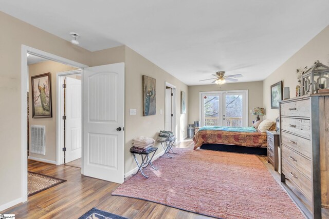 bedroom with wood-type flooring and ceiling fan