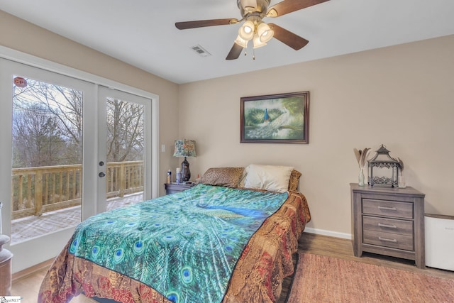 bedroom featuring hardwood / wood-style floors, access to outside, french doors, and ceiling fan