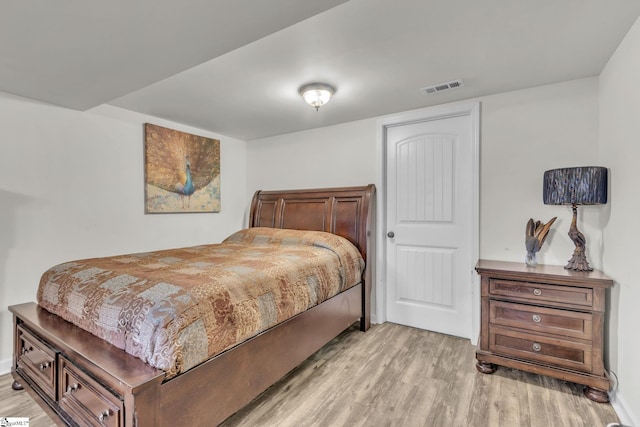 bedroom featuring light hardwood / wood-style floors