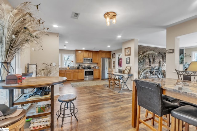 dining area with light hardwood / wood-style flooring